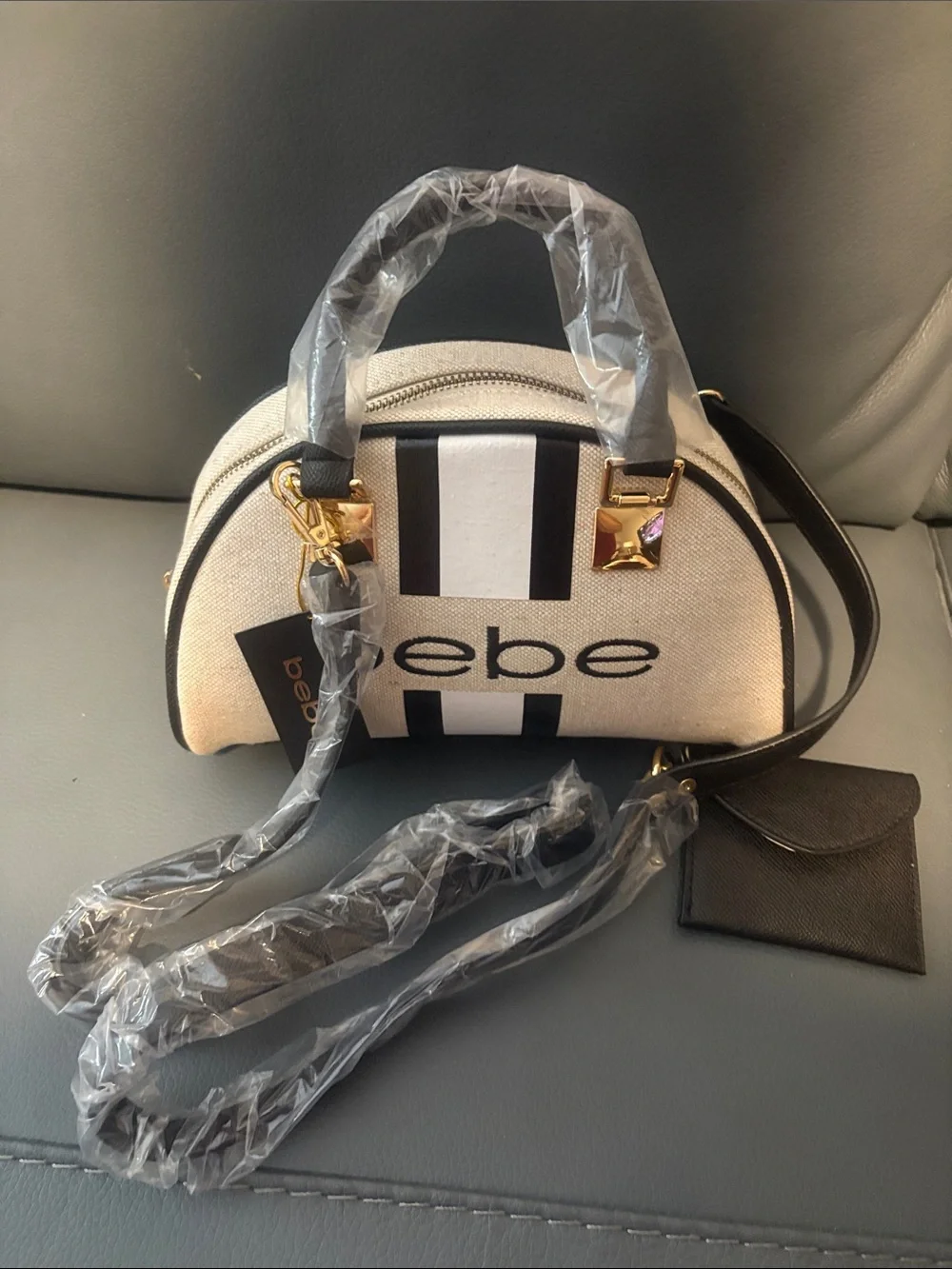 bebe Black & White Striped Dome Crossbody with Gold Hardware with accents - Picture 7 of 8